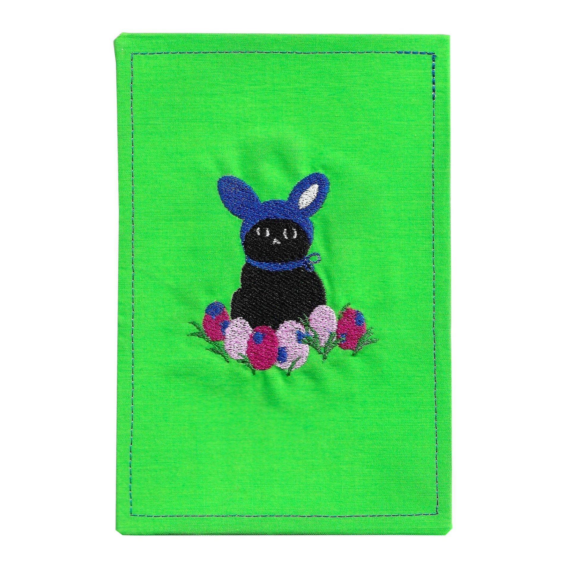 Green fabric card holder with a black cat in a blue sweater and Easter eggs design on a white background